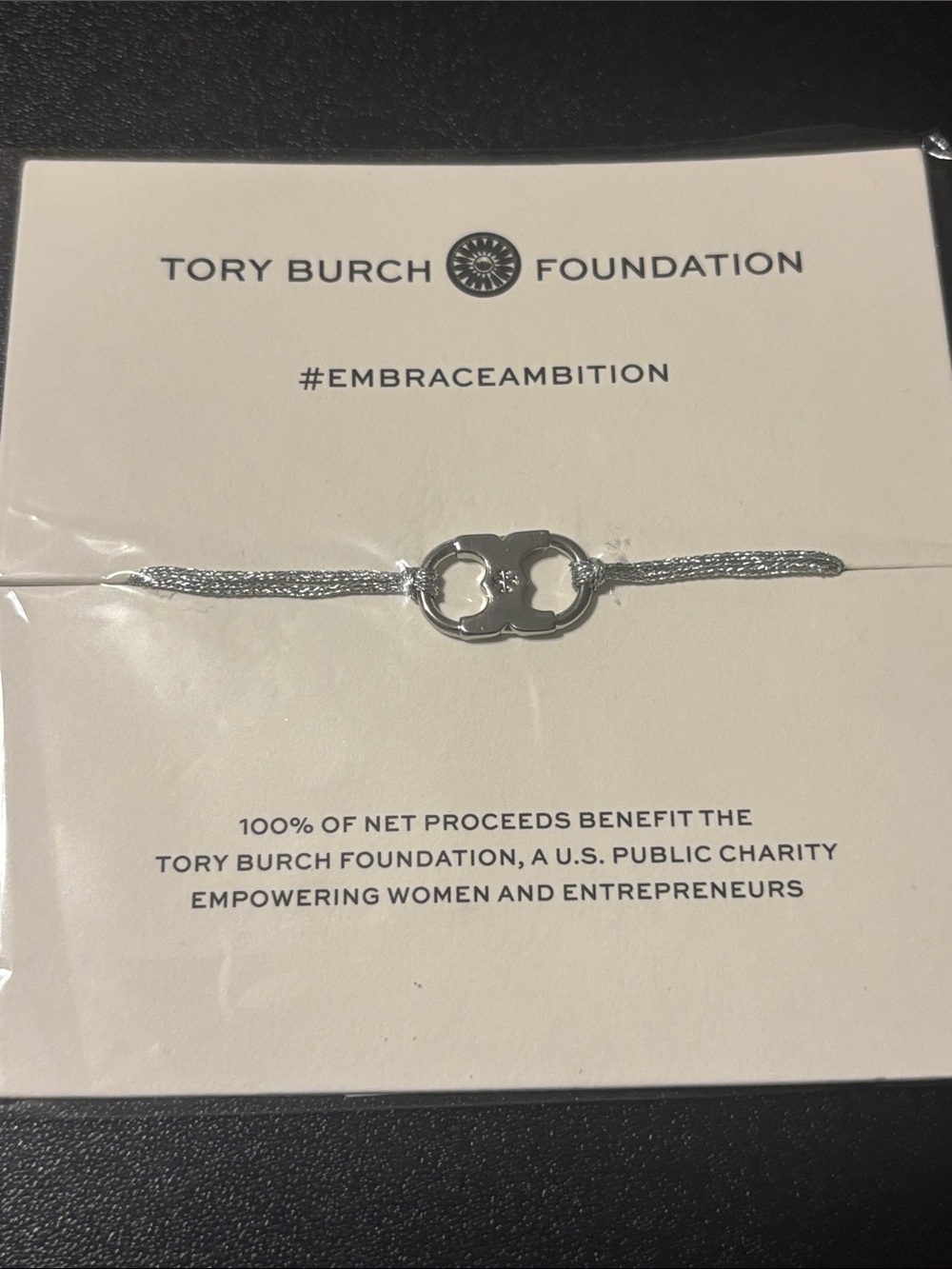 Tory Burch Silver Tone Logo Cord Bracelet